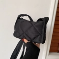 Chic black quilted puffer crossbody bag with elegant diamond stitching and handles - Black