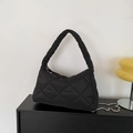 Black quilted puffer underarm bag for women with silver chain strap and hobo design - Black