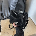 Black crinkle texture bucket bag with silver butterfly buckle and top handle - Black