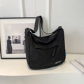 Minimalist black large capacity nylon tote bag with adjustable shoulder strap and logo - Black