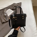 Black fashion tote bag with butterfly embossing and gold metal rivets in a casual style - Regular Fit / Black
