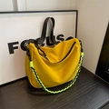 Bright yellow lightweight nylon crossbody bag with black woven strap and contrast chain - Yellow