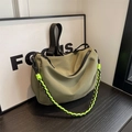 Olive green lightweight nylon dumpling crossbody bag with neon green woven strap - Green