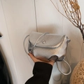 Silver metallic cloud crossbody bag with textured faux leather finish and thin strap - Silver