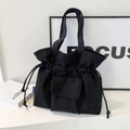 Elegante bolso tote de pana negra con cordón y bolsillo frontal para uso diario - Negro