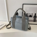 Borsa tote in tela grigio-blu Morandi con tracolla regolabile e ampi manici in stile moderno - Blu Nebbia