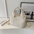 Borsa tote minimalista in tela color crema con tracolla e manici robusti e resistenti - Bianco Sporco