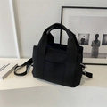 Borsa tote nera in tela minimalista con tracolla regolabile e scomparti multipli - Nero