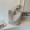 Large beige canvas tote bag with front pocket and zip closure for daily commute - Off White