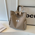 Khaki canvas tote bag with side zippers and FASHION label for casual use - Khaki