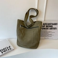 Large military green canvas tote bag featuring practical front zipper and slide pockets - Green
