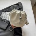 Creamy white drawstring bucket bag with textured leather and silver chain strap - Off White