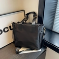 Minimalist black nylon tote bag with detachable shoulder strap and gold hardware - Black