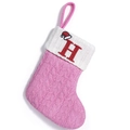 Pink knitted Christmas stocking with white cuff and red embroidered letter H hanging loop - Letter H