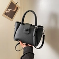 Borsa a secchiello retrò nera in pelle a grana con manico cilindrico e tracolla fine - Nero