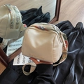 Off-white canvas crossbody bag featuring a colorful ethnic style wide shoulder strap - Off-white