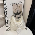 Chic cream-white marble-patterned tote bag with elegant lace bow and metal chain strap - Cream White