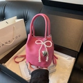 Rose pink litchi grain bucket bag with pearl bow charm in a black gift box - Rose Pink
