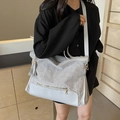 Silver glitter canvas tote bag with light grey leather trim and gold hardware details - Silver