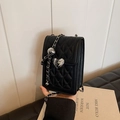 Vertical black quilted phone bag with silver heart lock and leather chain strap - Black