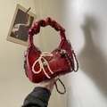 Burgundy wrinkled leather handbag with silver chain and pearl bow charm detail - With Pendant / Red