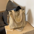 Beige canvas tote bag with adjustable crossbody strap and multi-pocket design - Khaki