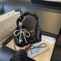 Glossy black pleated handbag with pearl bow charm and metal chain strap in a gift box - With Pendant / Black