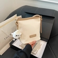 Elegante borsa a secchiello in velluto a coste bianco crema con finiture in pelle - Bianco Sporco