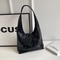 Minimalist black glossy hobo shoulder bag with silver heart charm and bow detail - Black