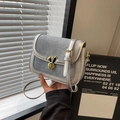 Silver faux leather saddle bag with blue denim flap and gold rabbit ear twist lock - Silver
