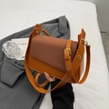 Vintage brown woven leather shoulder bag with adjustable strap and gold buckle detail - Brown