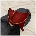 Detail of red glossy leather bucket bag with chunky gold chain strap and logo - No Pendant / Red