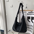 Minimalist large black canvas crossbody bag with adjustable wide shoulder strap - Black
