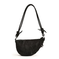 Chic black dumpling crossbody bag with crinkled texture and stylish knot strap detail - Black