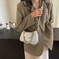 Silver metallic crossbody bag with pearl bead handle and crocodile pattern texture - Silver