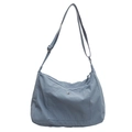 Lightweight light blue-grey large nylon crossbody bag with adjustable strap and front pocket - Blue