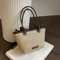 Mini straw woven bucket bag with brown leather knotted handles and crossbody strap - Khaki