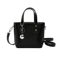 Minimalist black bucket handbag with horizontal embossed leather and silver ball charm - Black