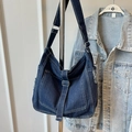 Retro denim shoulder bag in dark blue with white stitching and metal buckle accents - Dark Blue