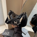 Minimalist black underarm bag with silver butterfly buckle and pearl chain strap - Black