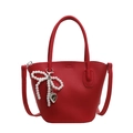 Elegant red bucket bag in litchi grain PU leather with pearl bow and heart pendant - Burgundy