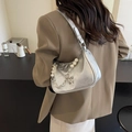 Chic silver metallic crescent hobo bag for women with pearl and butterfly charm detail - Silver