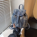 Mini sac à dos en jean pour femme avec paillettes argentées, cordon et lanières cuir - Bleu foncé