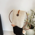 Chic cream woven phone bag with wood button closure and slim brown crossbody strap - Off White