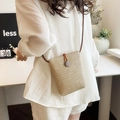Beige woven straw crossbody phone bag with dark brown drawstring and wood button - Khaki