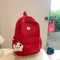 Red minimalist school backpack with a polar bear patch and plush star charm - Large / With Pendant / Red