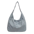 Minimalist light blue fabric tote bag with functional front pockets for daily commute - Haze Blue