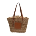 Bohemian style woven straw tote bag with brown leather straps and drawstring closure - Khaki