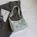 Mint green textured shoulder bag with golden butterfly accents and metal chain strap - Small / Light Green