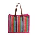 Large woven tote bag with colorful vertical stripes and dark brown faux leather handles - Pink